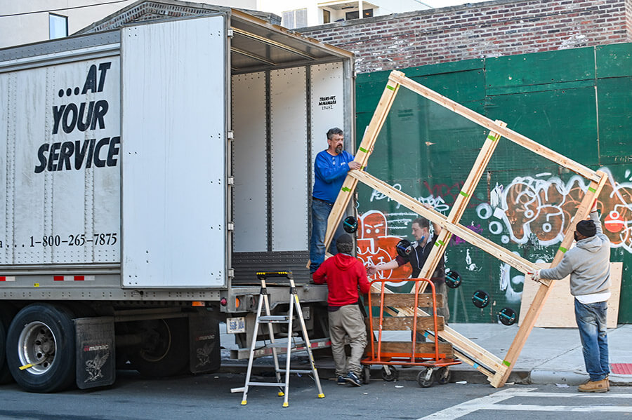 people loading a moving truck