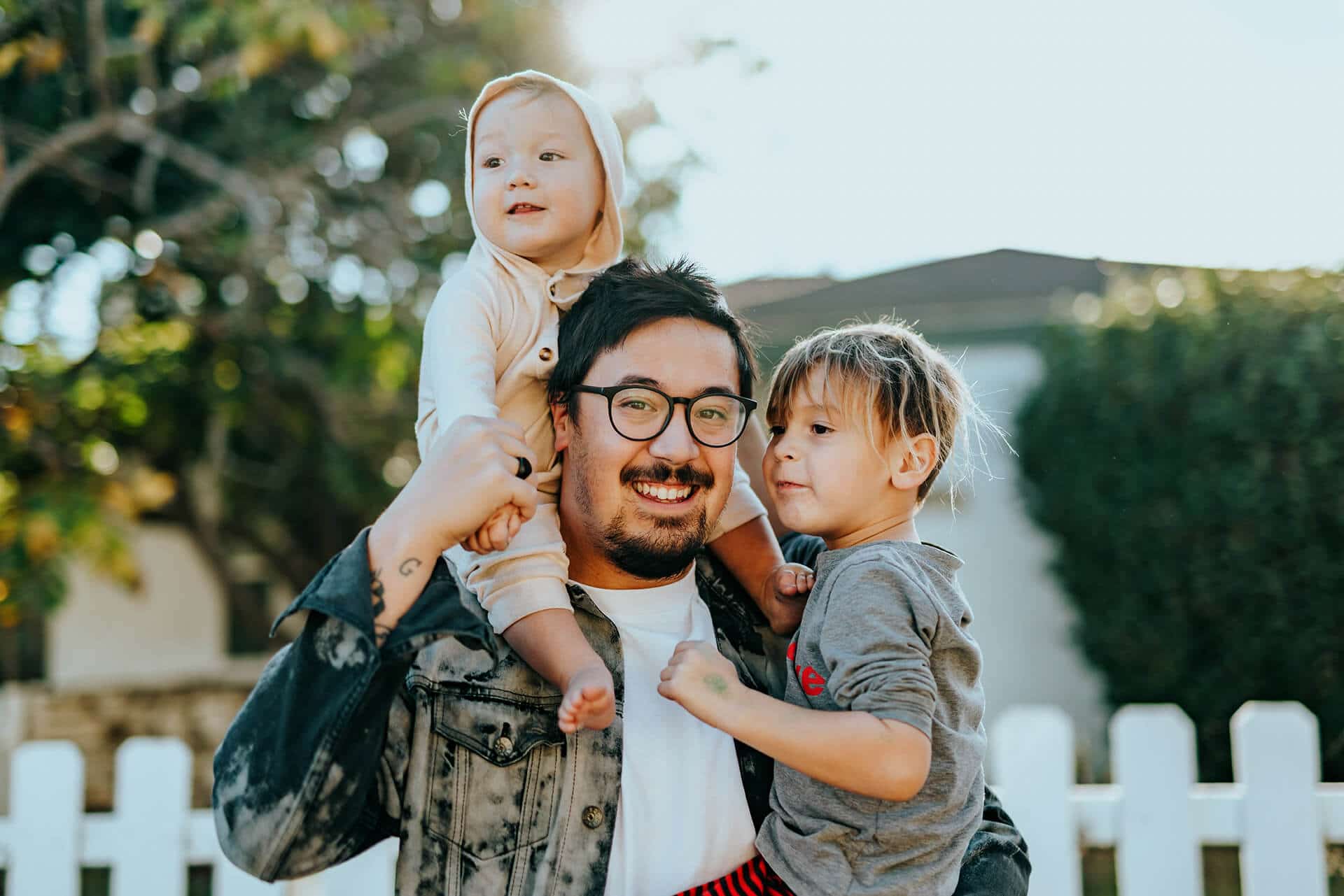 Man with two kids - property management banner