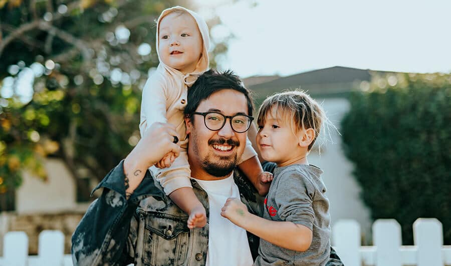 father with two kids - Selling your home