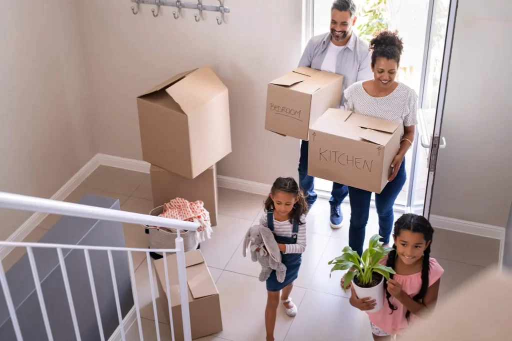 Family moving into a house: Make Rental Property Appealing to Families