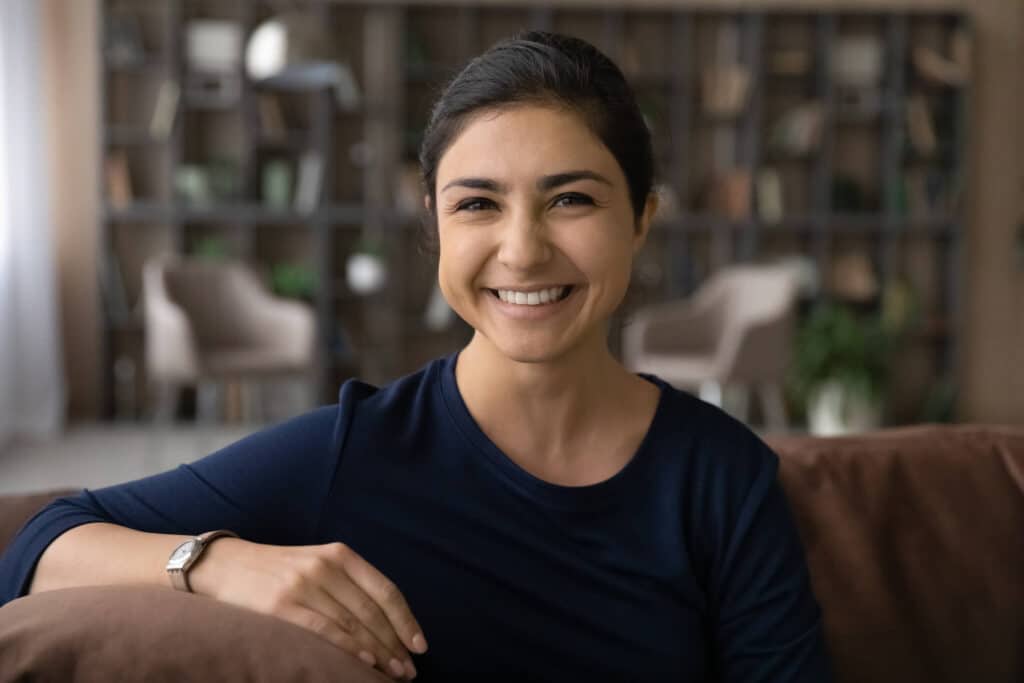 A happy woman smiling.